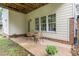 Outdoor patio with seating, providing a great space for relaxation and enjoying the yard at 104 Edgewater Cir, Chapel Hill, NC 27516