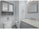 Updated bathroom with new fixtures, vanity, and decorative mirror at 109 Gladstone Dr, Durham, NC 27703