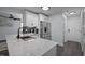 Modern kitchen with stainless steel appliances and a marble countertop island at 109 Gladstone Dr, Durham, NC 27703