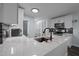 Spacious kitchen with white cabinets, marble countertops, and modern appliances at 109 Gladstone Dr, Durham, NC 27703