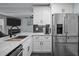 Modern kitchen with stainless steel appliances, and a marble countertop island at 109 Gladstone Dr, Durham, NC 27703