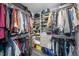 Functional walk-in closet with built-in shelving providing ample storage solutions at 109 Gladstone Dr, Durham, NC 27703