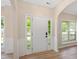 Bright entryway featuring archway, stylish flooring, and large windows at 121 River Hills Dr, Clayton, NC 27527