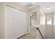Upstairs hallway with closet and view into bedroom at 121 River Hills Dr, Clayton, NC 27527