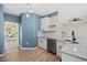 Bright kitchen features granite countertops, stainless steel appliances, and modern lighting at 121 River Hills Dr, Clayton, NC 27527