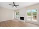 Spacious living room with fireplace and large windows at 121 River Hills Dr, Clayton, NC 27527