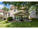 Backyard featuring a patio, comfortable seating, and a lush green lawn at 121 Walter Hagen Dr, Mebane, NC 27302