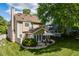 The home features a manicured backyard with patio and seating area perfect for outdoor entertaining at 121 Walter Hagen Dr, Mebane, NC 27302