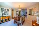 Traditional dining room with a wooden table, chandelier, and easy access to the main living spaces at 121 Walter Hagen Dr, Mebane, NC 27302
