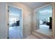 Hallway view showcasing doorways to an office and bedroom at 121 Walter Hagen Dr, Mebane, NC 27302