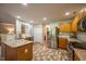 Open eat-in kitchen featuring granite countertops, stainless appliances, and an adjacent breakfast area at 121 Walter Hagen Dr, Mebane, NC 27302
