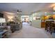 Open-concept living space showcasing seamless flow from living to kitchen to dining areas at 121 Walter Hagen Dr, Mebane, NC 27302
