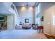 Bright and airy living room with high ceilings and large windows, offering ample natural light at 121 Walter Hagen Dr, Mebane, NC 27302
