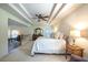 Main bedroom showcasing a tray ceiling, ceiling fan, and ample space at 121 Walter Hagen Dr, Mebane, NC 27302