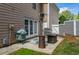 Outdoor patio with furniture, grill, and lush green lawn at 121 Walter Hagen Dr, Mebane, NC 27302
