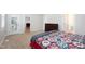 Bedroom with vaulted ceiling, carpet flooring, and a view to the bathroom and living room at 1218 Crystalwater Dr, Fuquay Varina, NC 27526