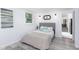 Comfortable bedroom with a plush bed, soft lighting, and wood-style flooring at 126 Barclay Rd, Chapel Hill, NC 27516