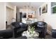 Open-concept living room and kitchen with modern furnishings, natural light, and a seamless flow for comfortable living at 126 Barclay Rd, Chapel Hill, NC 27516