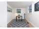 Office area with modern desk, neutral walls, and patterned rug at 126 Barclay Rd, Chapel Hill, NC 27516