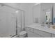 Modern bathroom featuring a glass-enclosed shower, stylish vanity, and neutral finishes at 1338 The Parks Dr, Pittsboro, NC 27312