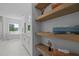Bathroom features a soaking tub, walk-in shower, double vanity, and modern finishes at 1338 The Parks Dr, Pittsboro, NC 27312