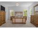 Bright bedroom with large windows offering plenty of natural light and stylish furniture at 1338 The Parks Dr, Pittsboro, NC 27312