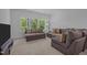 Spacious living room with large windows offering abundant natural light at 1338 The Parks Dr, Pittsboro, NC 27312