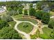 Overhead view of the neighborhood park featuring walking trails and picnic structures at 1338 The Parks Dr, Pittsboro, NC 27312