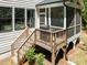 Screened-in porch with a wooden grill at 1338 The Parks Dr, Pittsboro, NC 27312