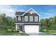 Charming two-story home with a dark gray exterior, a front-entry garage and a well-manicured lawn at 1412 Maple Branch Cir # 35, Graham, NC 27253