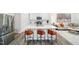 Modern kitchen with stainless steel appliances, white cabinets, and counter seating at 1412 Maple Branch Cir # 35, Graham, NC 27253