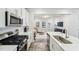 Modern kitchen featuring stainless steel appliances and an open concept layout at 1412 Maple Branch Cir # 35, Graham, NC 27253