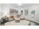 Cozy living room with neutral tones, decorative pillows, and natural light at 1412 Maple Branch Cir # 35, Graham, NC 27253