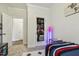 Cozy room with playful decor, soft carpet, and ample storage at 145 Cassada Ct, Holly Springs, NC 27540