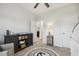 Nautical themed bedroom, with a decorative dresser and nautical decor at 145 Cassada Ct, Holly Springs, NC 27540
