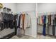 Spacious walk-in closet with ample hanging storage, perfect for organization at 145 Cassada Ct, Holly Springs, NC 27540