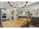 Open-concept dining area adjacent to the kitchen and living room at 145 Cassada Ct, Holly Springs, NC 27540