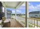 Charming front porch with a seating area and neighborhood views at 145 Cassada Ct, Holly Springs, NC 27540