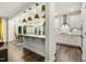 Open concept kitchen with a spacious island and stainless steel appliances at 145 Cassada Ct, Holly Springs, NC 27540