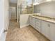 Bathroom features a double vanity, a glass enclosed shower, and tile flooring at 1517 Chestnut Falls Rd, Wendell, NC 27591