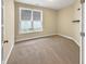 Bedroom with neutral walls, carpet and a window providing natural light at 1517 Chestnut Falls Rd, Wendell, NC 27591