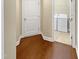 Laundry room features tile floor and modern washer and dryer at 1517 Chestnut Falls Rd, Wendell, NC 27591