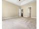 Large main bedroom with neutral walls, carpet, and white trim throughout at 1517 Chestnut Falls Rd, Wendell, NC 27591