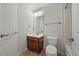 Bathroom featuring a single vanity, mirror, and toilet with tiled floors at 1704 Fawn Chase Ct, Wake Forest, NC 27587