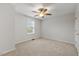 Bedroom features carpet flooring, ceiling fan and a window for natural light at 1704 Fawn Chase Ct, Wake Forest, NC 27587