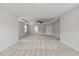 Large bedroom offers neutral carpeting, ceiling fan, and tray ceiling at 1704 Fawn Chase Ct, Wake Forest, NC 27587