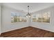 Bright dining area with large windows offering great backyard views at 1704 Fawn Chase Ct, Wake Forest, NC 27587