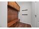 Functional mud room with built-in bench, cubbies, and coat hooks at 1704 Fawn Chase Ct, Wake Forest, NC 27587