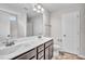 Bathroom featuring a double vanity, a large mirror, and a shower at 173 Forsyth Pkwy Pkwy, Clayton, NC 27520