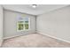Neutral bedroom with carpet and natural light from a window with blinds at 173 Forsyth Pkwy Pkwy, Clayton, NC 27520